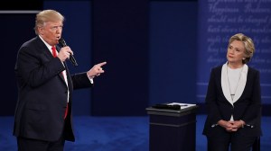 ST LOUIS, MO - OCTOBER 09:  Republican presidential nominee Donald Trump (L) speaks as Democratic presidential nominee former Secretary of State Hillary Clinton looks on during the town hall debate at Washington University on October 9, 2016 in St Louis, Missouri. This is the second of three presidential debates scheduled prior to the November 8th election.  (Photo by Win McNamee/Getty Images)