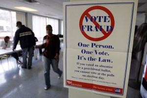 CLEVELAND, OH - NOVEMBER 4: A voter fraud sign is seen at Lupica Towers November 4, 2008 in Cleveland, Ohio. Voting is underway in the US presidential elections with Sen. Barack Obama (D-IL) leading in the race against the Republican presidential nominee Sen. John McCain (R-AZ). (Photo by J.D. Pooley/Getty Images)